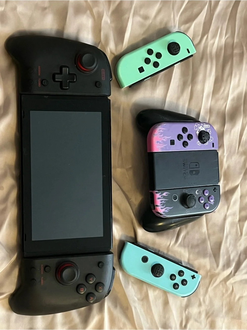 Nintendo Handheld Console with Mint and Purple Joy-Con Accessories